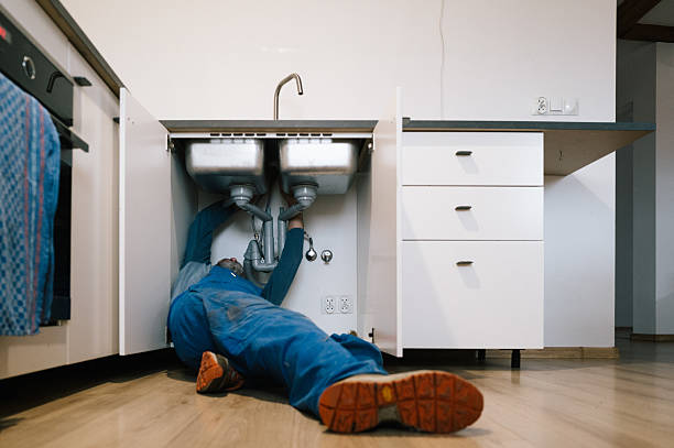 Professional Drain Cleaning technician working in Scalf, KY